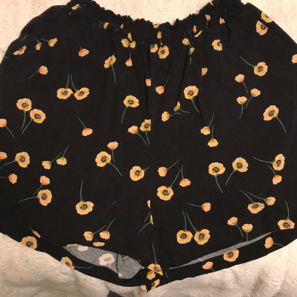 Black flowing shorts with a cinched waist band